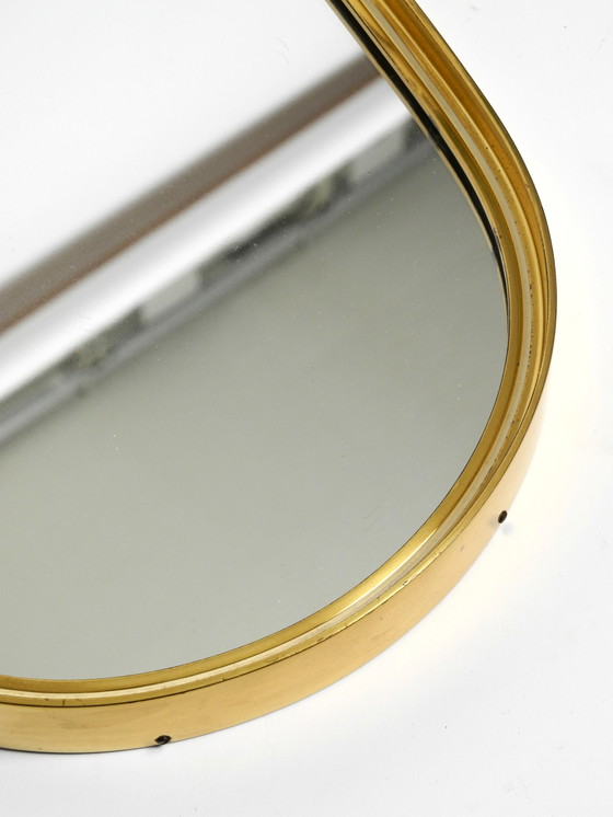 Image 1 of Prachtige kleine massief Mid Century messing wandspiegel van Münchener Zierspiegel