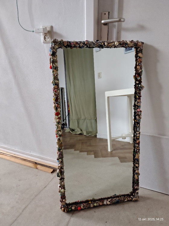 Image 1 of Large mirror with shell rim in a sturdy frame.