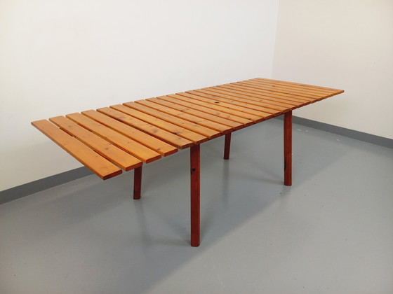 Image 1 of Vintage garden furniture consisting of a table with extensions and 4 wooden armchairs from the 60s