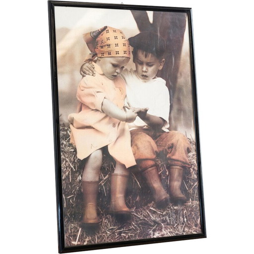 Vintage print with a little boy and a little girl with scarves holding hands, Italy 2000
