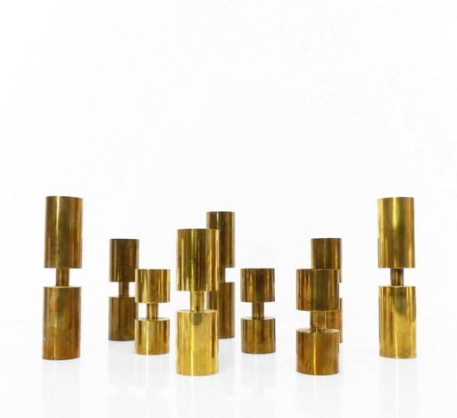 Set of 9 Scandinavian candlesticks in solid brass Zoéga, Sweden, 1976