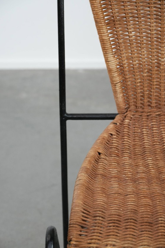 Image 1 of 2x Vintage design eetkamerstoelen van Frederick Weinberg met een gietijzeren frame