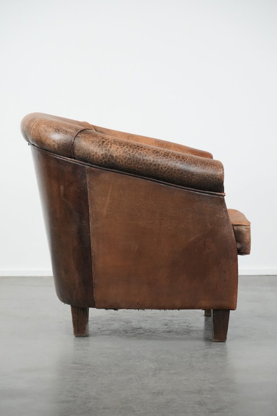 Image 1 of Timeless vintage sheepskin club armchair with character and a beautiful patina