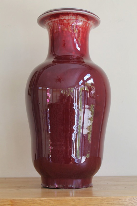 Image 1 of Antique Chinese "sang de boeuf" vase. (one of 2 available)