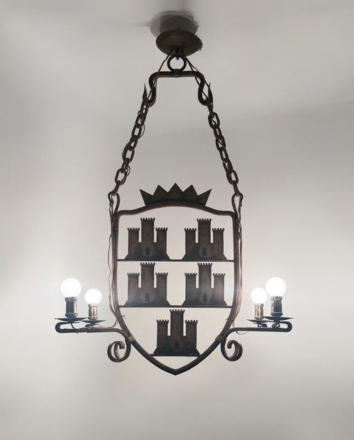 Medieval-style heraldic wrought-iron chandelier