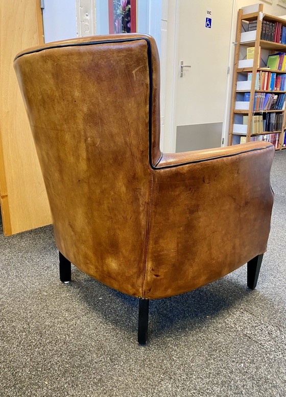 Vintage sheepskin leather sofa + armchair – Lounge Atelier, Seating area, Wood (photo 2 of 14)