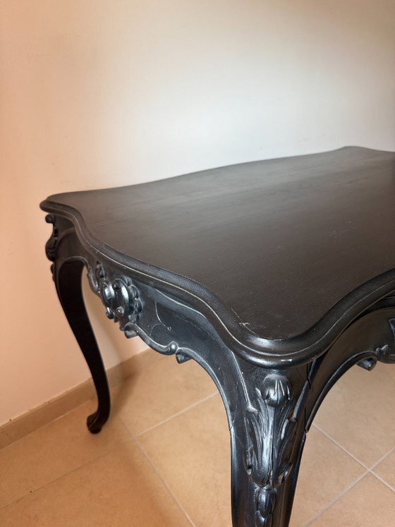 Image 1 of Mesa de comedor/escritorio de estilo barroco en madera de haya negra.