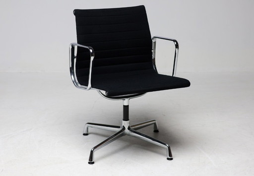 Set of six Vitra Eames EA 108 black, swivel, chairs..