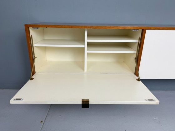 Image 1 of Florence Knoll voor Knoll, notenhouten hangkast, model 122 W-1, 1947