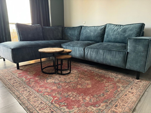 As good as new petrol colored corner sofa
