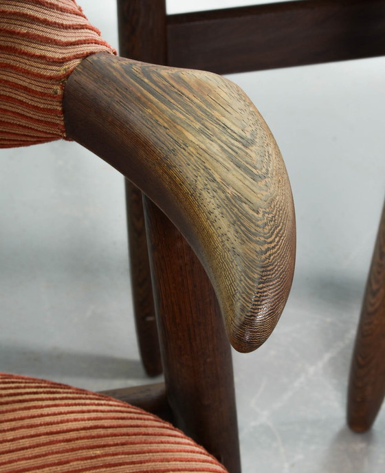 Image 1 of Authentieke Cowhorn Tijsseling eetkamerstoelen met wengé houten frame en steenrode bekleding door Hulmefa - Set van 4