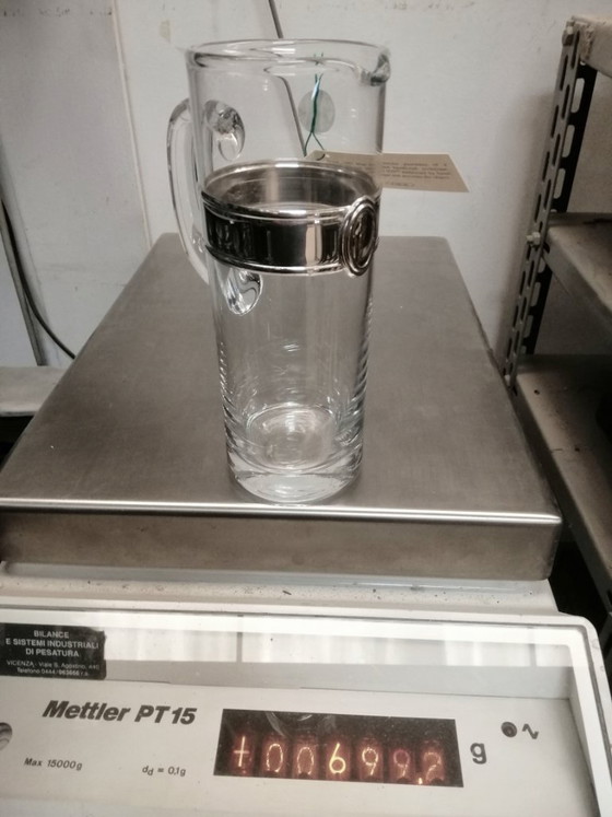 Image 1 of Karaf van geblazen glas met een band van 925 zilver.