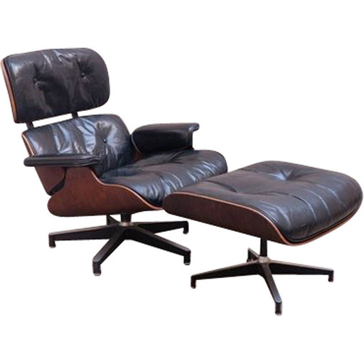 Poltrona vintage in palissandro con pouf di Charles e Ray Eames per Herman Miller, 1970