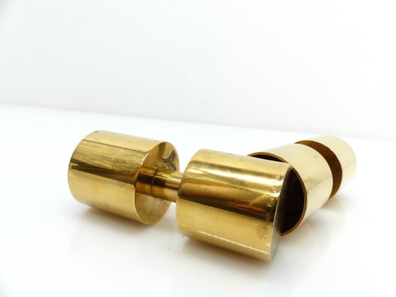 Image 1 of Een paar Zoégas Kaffe kandelaars van massief messing, Zweden 1976.