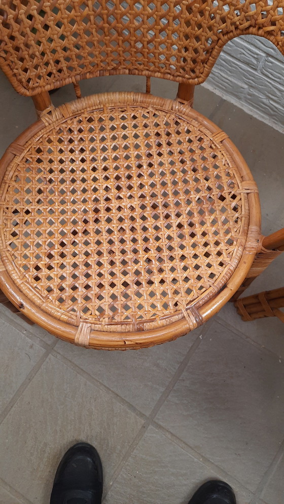 Image 1 of Set di 2 poltrone vintage in rattan con seduta e schienale intrecciati.