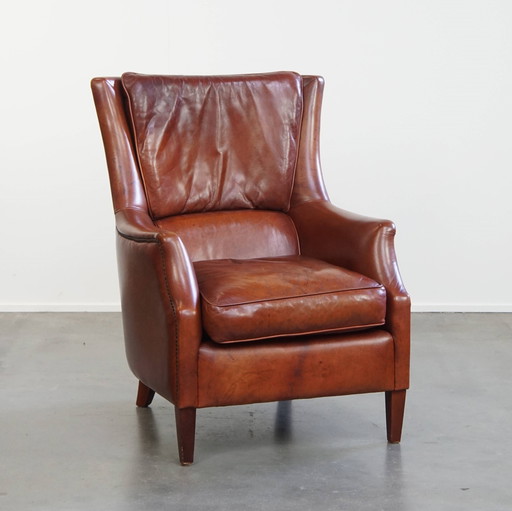 Fauteuil/chaise en cuir de boeuf couleur cognac