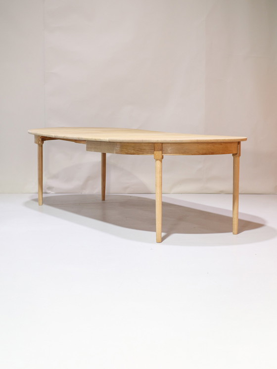 Image 1 of Extendable dining table Henning Kjaernulf oak Danish