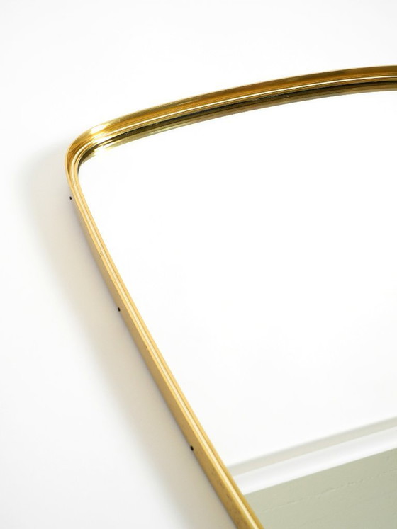 Image 1 of A pair of rare original Mid Century Modern "Münchener Zierspiegel" wall mirrors with heavy brass frames