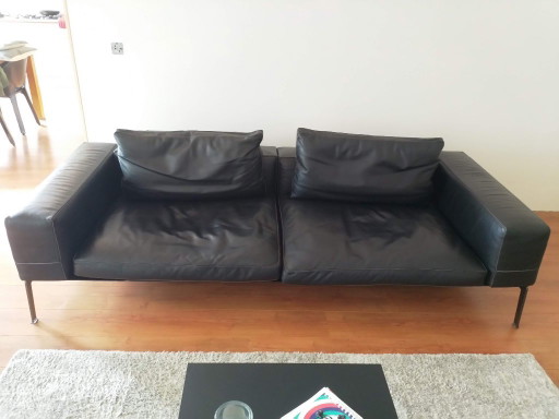 Flexform zwarte leren 2-zitsbank en fauteuil