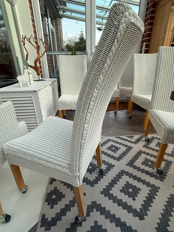 Image 1 of 8 originele Lloyd LOOM stoelen, eetkamerstoelen, ook in kleinere aantallen verkrijgbaar, houten frame, wit riet.