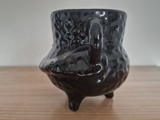 Vase tripode noir et blanc