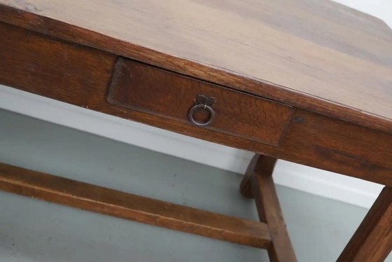 Image 1 of Early 20th-century French rustic country dining table made of oak and elm
