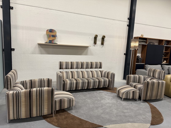 Image 1 of 2 Leolux Goncharov Sessel mit Ottomanenbezug