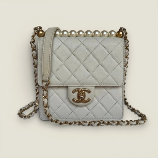 Chanel chic pearl flap bag