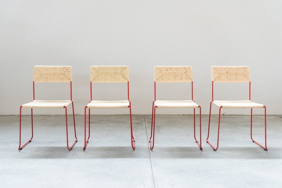 Image 1 of Design italiano scultoreo e sorprendente: sedie da pranzo in ferro rosso acceso e paglia naturale