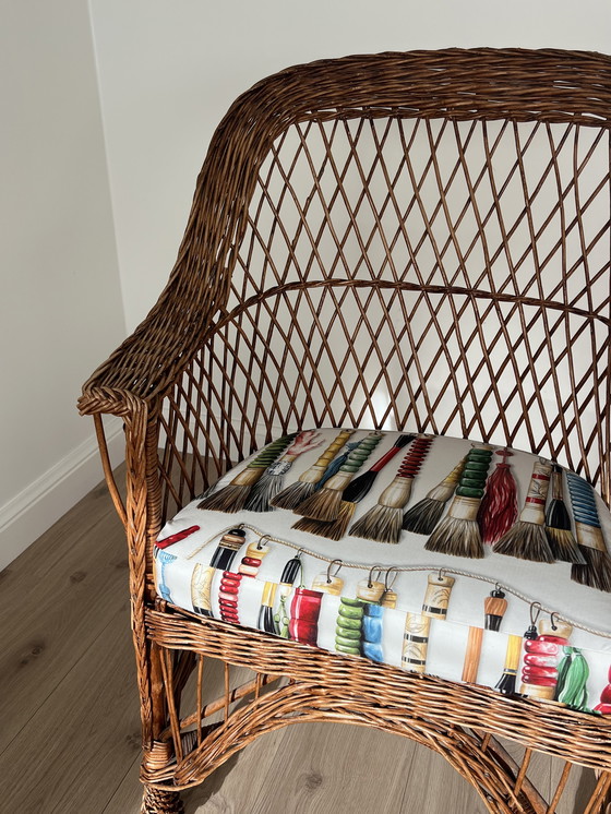 Image 1 of Pierre Frey geflochtener Sessel mit Kissen