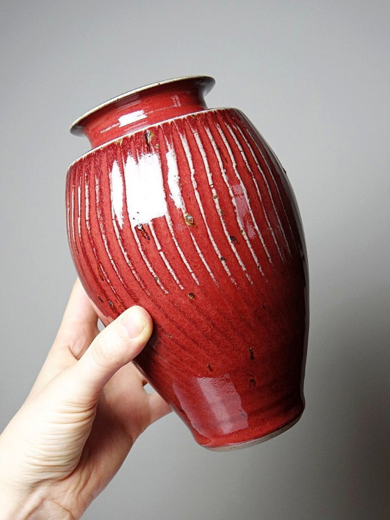 Image 1 of Oxblood-blood glazed stoneware vase with ribs, 20th-century workshop piece