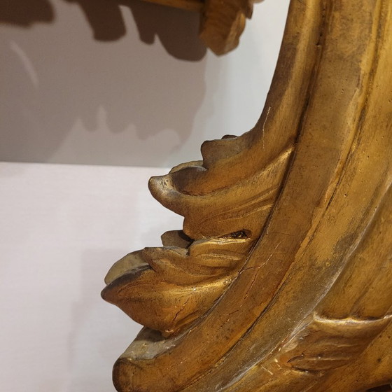 Image 1 of Consolle a muro, in legno intagliato e dorato, stile Luigi XV, XVIII secolo – Francia