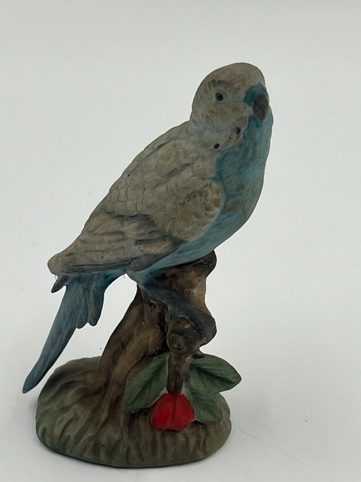 Figurine de perruche en céramique
