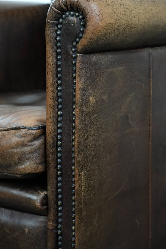 Image 1 of Fauteuil vintage en peau de mouton avec du caractère