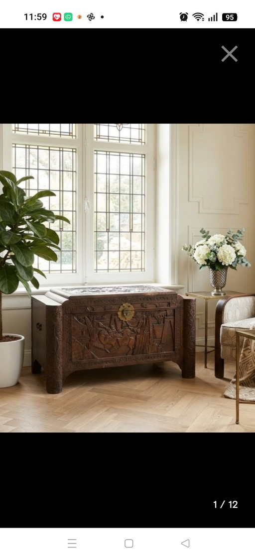 Antique Chinese chest with deep wood carving