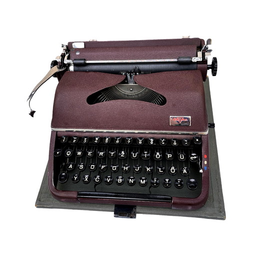 Burgundy Groma Model T Travel Typewriter, Germany, 1953.