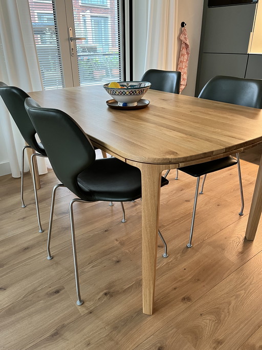 Vier groene leren stoelen van Design on Stock