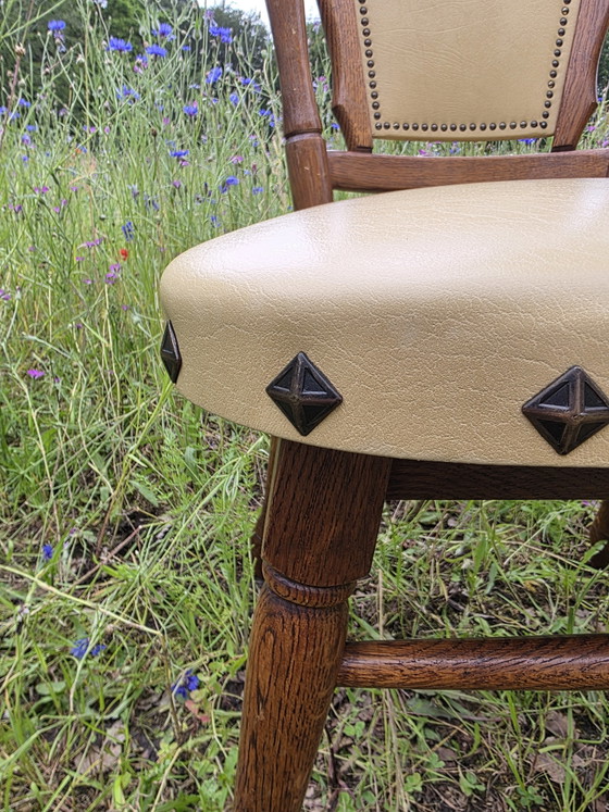 Image 1 of Set of 2 solid oak chairs with decorative nails