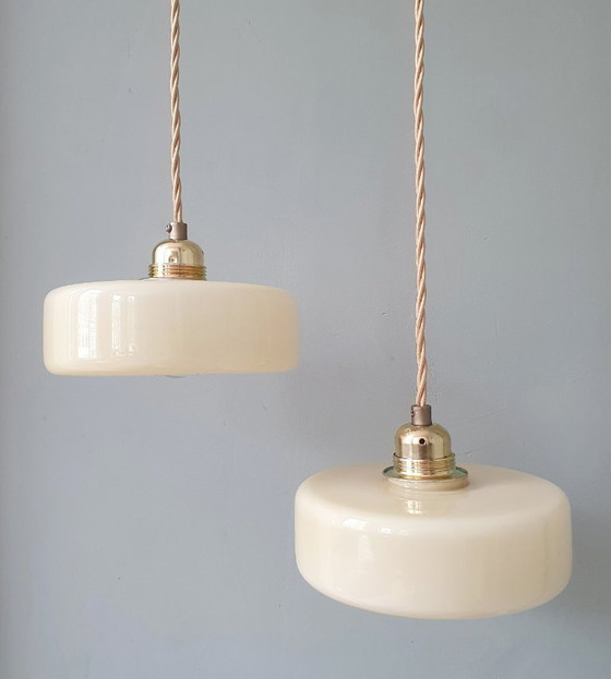 Image 1 of Vintage pendant lamp set (2) of yellow pastel opaline glass. Art Deco design.