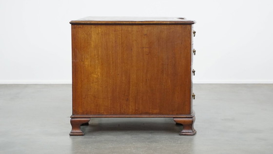 Image 1 of Luxurious and antique English wooden desk from the late 19th century with a leather top and a curved front.
