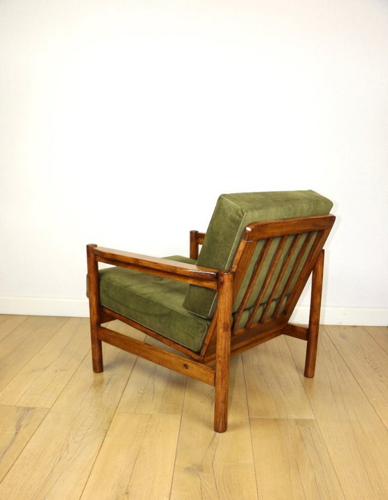 Image 1 of Wooden armchair designed by Z. Baczyk in a vintage style, upholstered in olive green velvet.