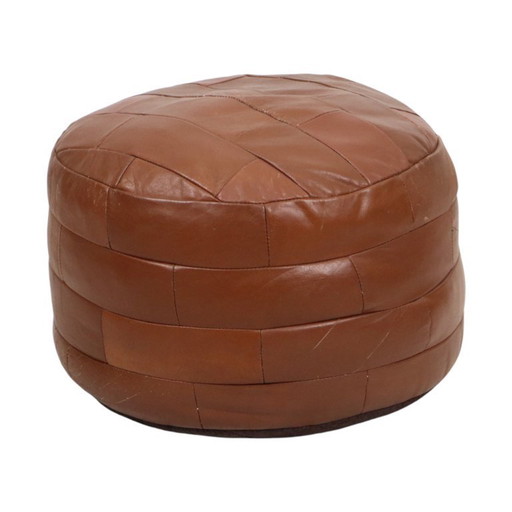 Pouf rotondo vintage in similpelle con patchwork