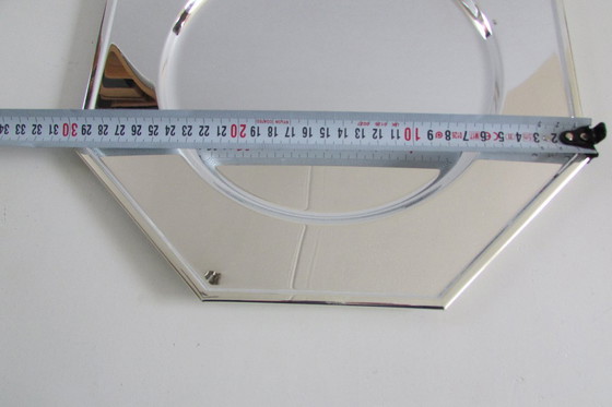 Image 1 of Dos platos base plateados en su embalaje original.