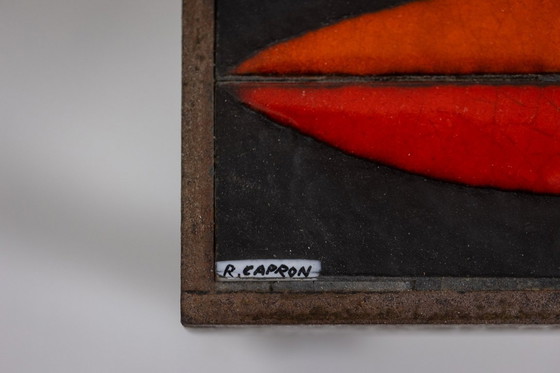 Image 1 of Capron. Tavolino "navette" in gres smaltato nero e rosso. 1960 circa.
