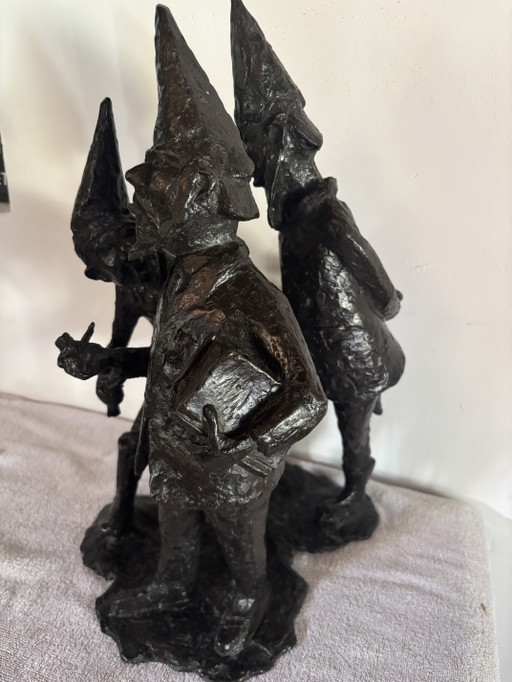 Bronze sculpture of gnomes: Administrator, official, population. Located in park in Made, Netherlands!