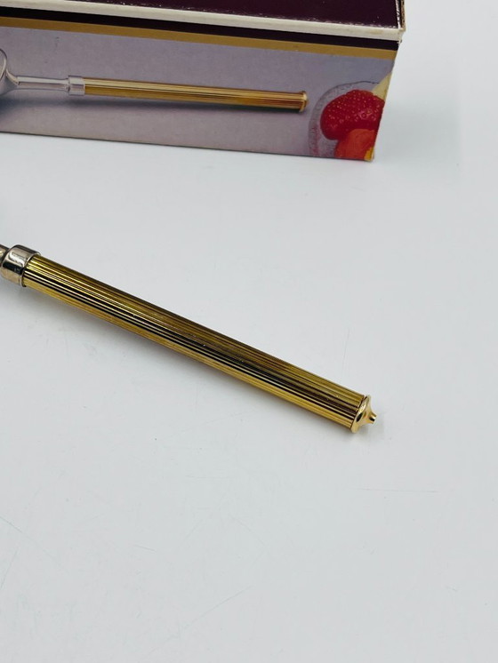 Image 1 of Cuchara para helado de diseño con mango dorado