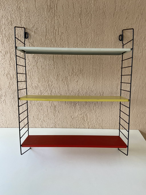 Wall rack by 'Tomado Holland' from the 1960s