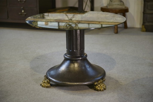 Neo-classical cast iron and verre églomisé coffee table, 1940s