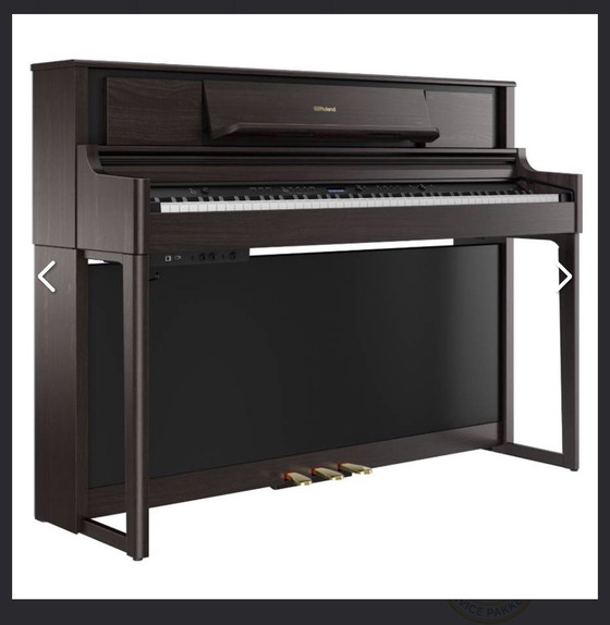 Image 1 of Uitstekende Roland XL705-DR piano - palissanderhout