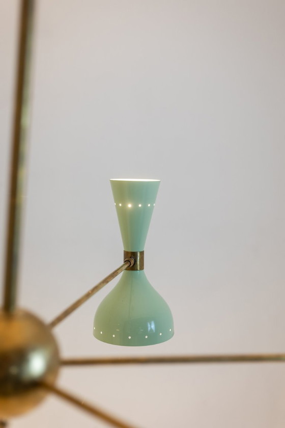 Image 1 of Lustre rayonnant de forme diabolo à 12 lumières. Contemporain.